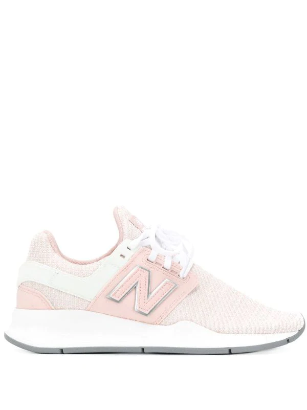 Shop pink New Balance 247 sneakers with 